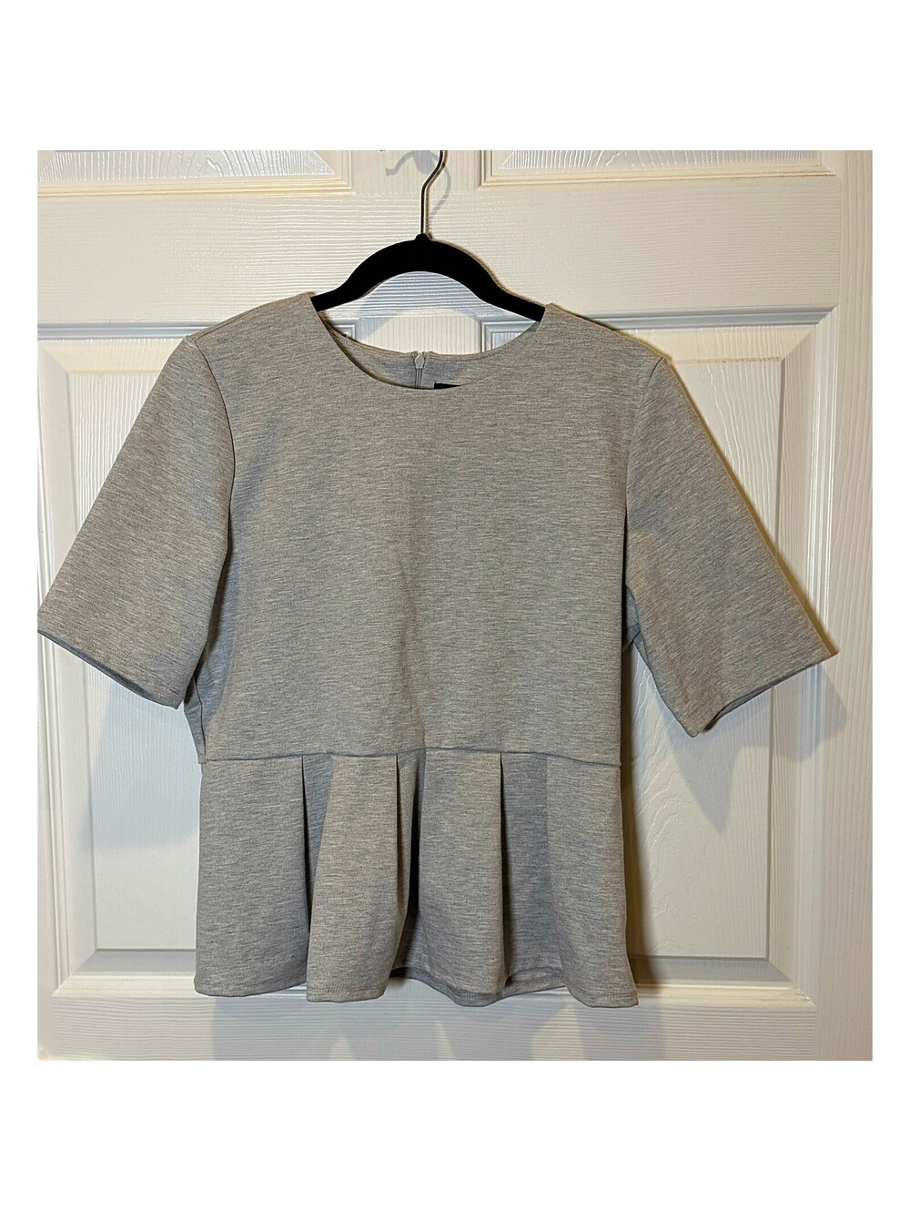 Peplum short sleeve top